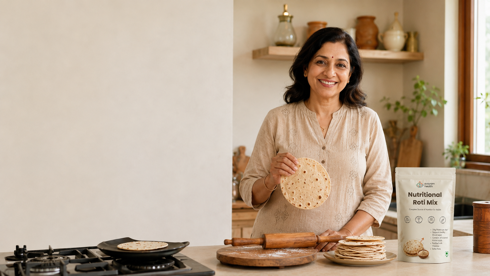 Woman in her kitchen holding a fresh roti, Svayam Nutritional Roti Mix pack on the counter